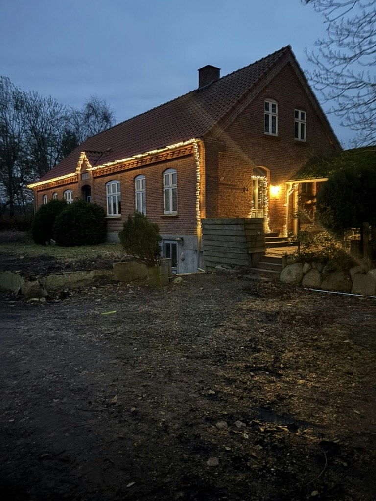1914 brick farmhouse in open countryside